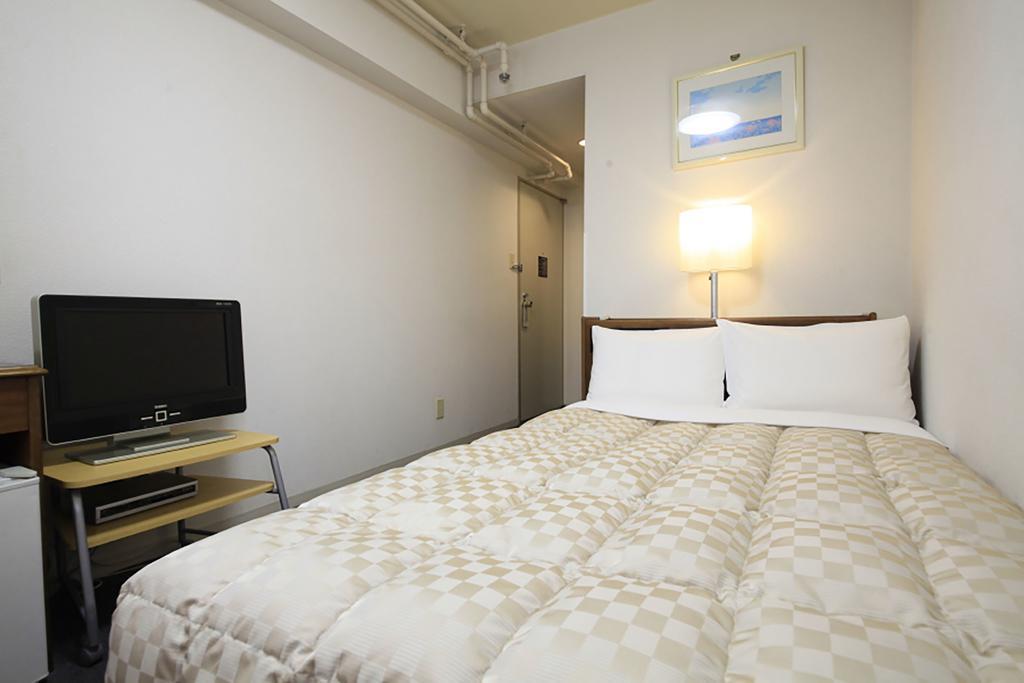 Shinjuku Urban Hotel Токио Номер фото